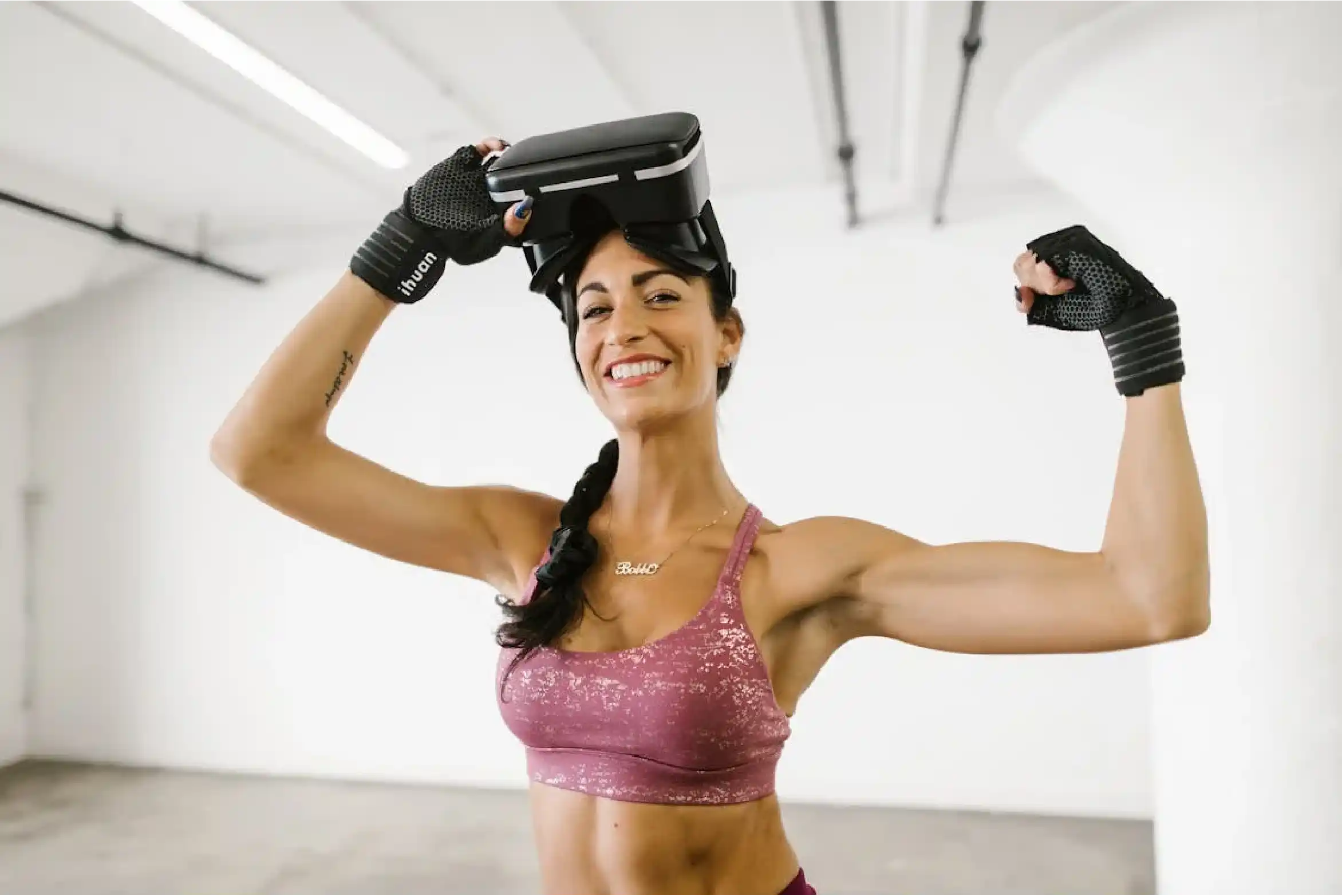 Boxer lifting a VR headset and flexing