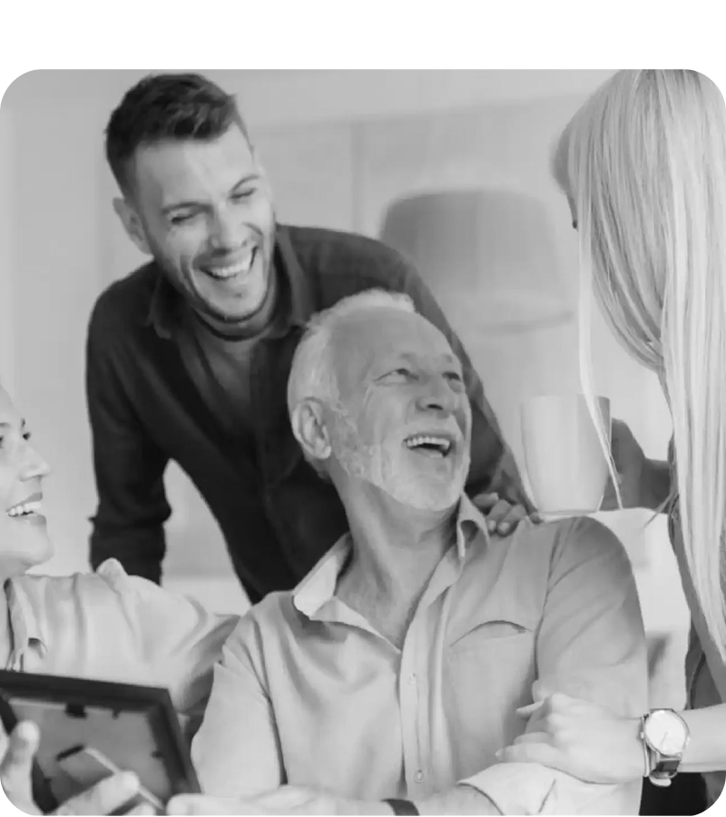 Man laughing with his elderly father